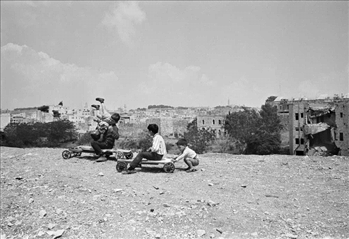 Kids on a skateboard, Jerusalem 1967