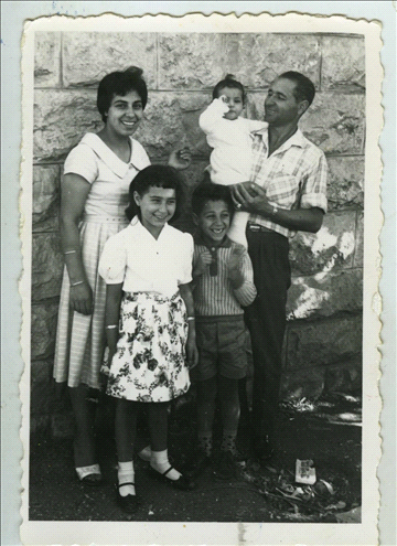 Georgette with her husband and children